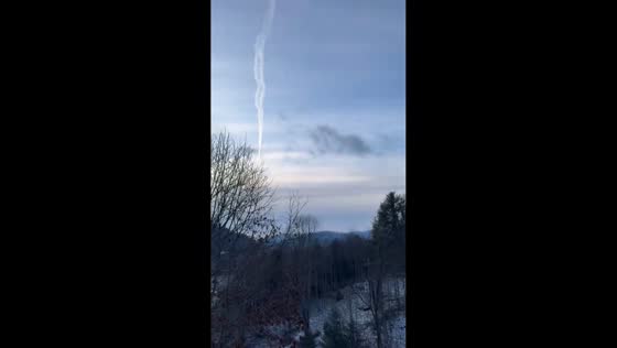 Snowflakes dust the Watauga River valley in Valle Crucis, North Carolina, USA
