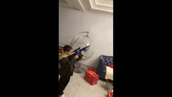 Boy breaks chandelier while playing with toy gun in Jiangxi, China