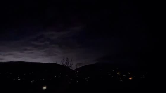 Nighttime thunderstorm lights up skies over Eden, Utah, USA