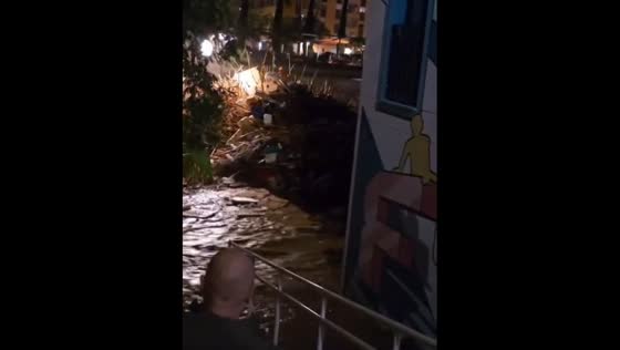Flooding in Picanya, Valencia carries debris after torrential rains