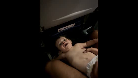 Baby startled but safely caught on plane in Dallas, Texas