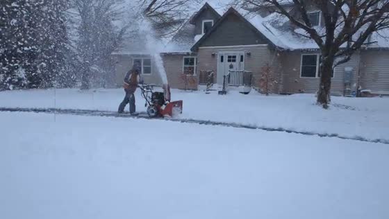Heavy snow cleared on Thanksgiving morning in Cadillac, Michigan, USA