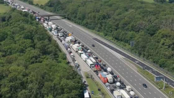 Major M25 crash causes miles of traffic during heatwave in Surrey, England, UK