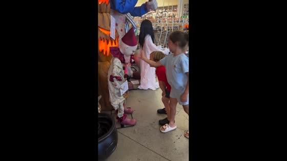 Boy startled by moving clown display in Los Angeles, USA
