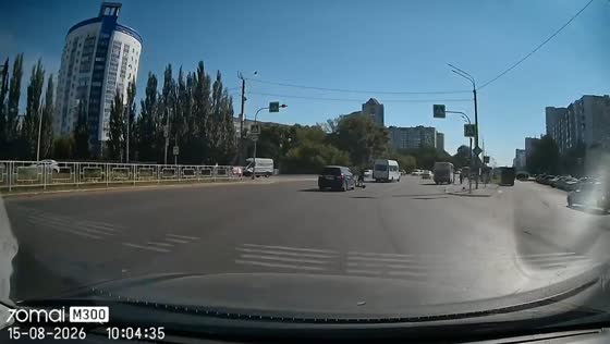 Toyota Wish strikes electric scooter rider at pedestrian crossing in Barnaul, Russia