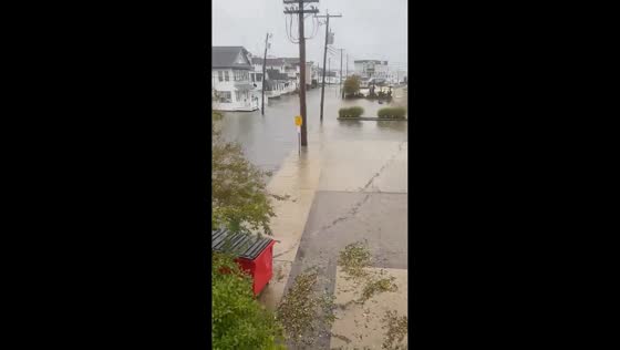 Severe flooding submerges Ninth Street Bridge entrance in Ocean City, USA