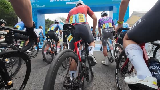 Cyclists crash moments after race start in Beijing, China