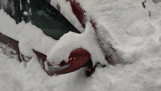 Heavy overnight snowfall buries car and streets in Minakami, Japan