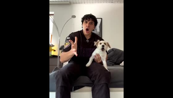 Singing duo of dog and owner