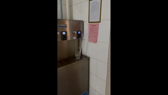 Automatic hot water dispenser causes funny spill in Shanxi, China
