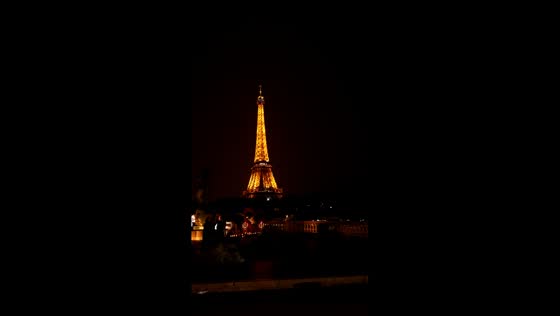 Lightning illuminates Eiffel Tower during thunderstorm in Paris, France
