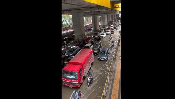 Torrential rain floods Andheri West Metro Station, Mumbai