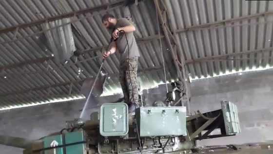 Ukrainian soldier's unconventional tanker cleanup: a horse-powered endeavor