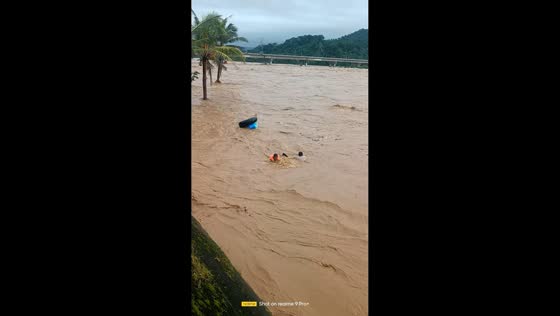River rescue during shear line flooding in Bato, Catanduanes, Philippines