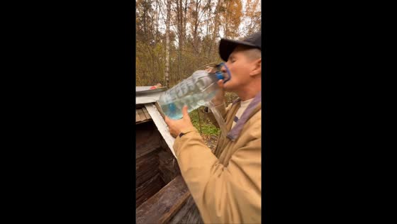 Man gets drenched after trying to drink from an old well in Yekaterinburg, Russia
