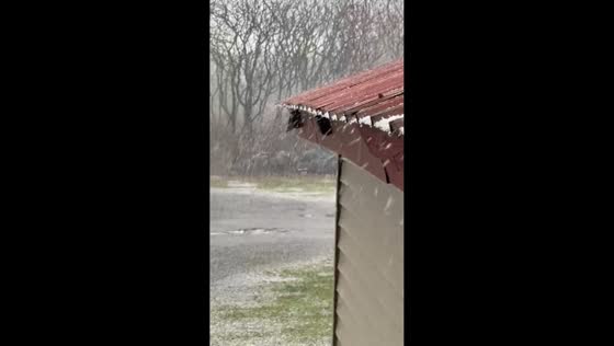 Graupel bursts blanket the area in Altmar, New York, USA