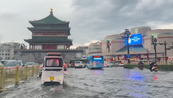 Heavy rain floods streets near Xi'an Bell Tower in Shaanxi, China