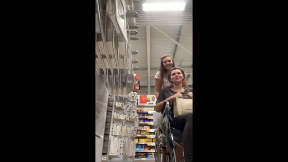 Sisterly laughter as wheelchair is overturned in Cambridge