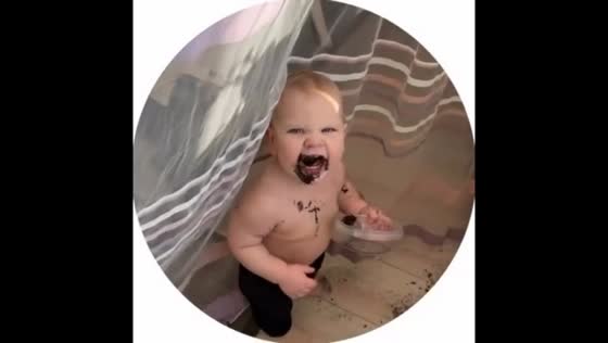 Toddler caught eating lunch behind curtain in Borisov, Belarus