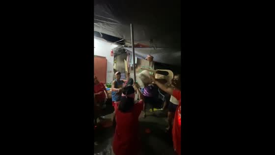 Girl accidentally hits tarp full of water during party games in Pasay City, Philippines