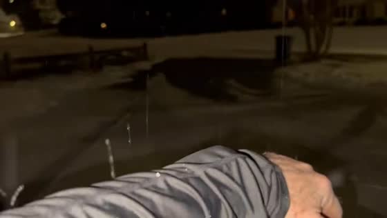 Evening sleet falls after rain in Winston-Salem, North Carolina, USA