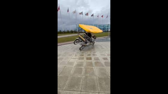 Boy overturns four-wheeled bicycle during fast turn in Sochi, Russia