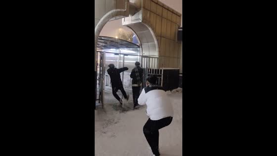 College student creates magical moments as passersby tumble into winter whimsy