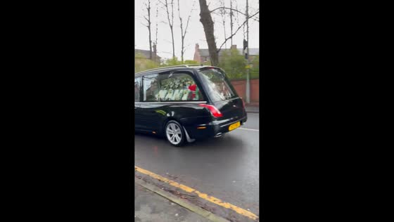 Funeral procession honors Stone Roses bassist Mani in Manchester, UK
