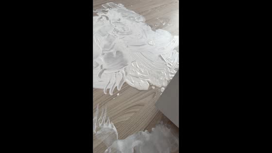 Young child smears paint around home during cabinet painting in Kocaeli, Turkey