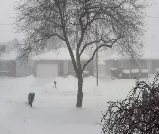 Fast-moving snow squall causes whiteout conditions in Brooklyn, Ohio, USA