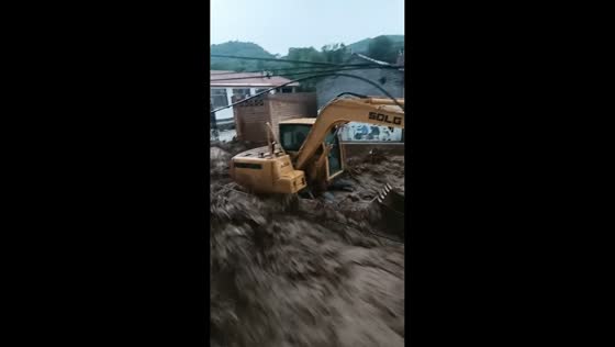 Flash flood and mudflow sweep through village in Lüliang, Shanxi, China