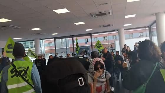 Sud Rail workers occupy Tesla dealership during strike action in Saint-Ouen-sur-Seine, Paris, France