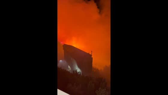Large wildfire spreads toward buildings along Amalfi Coast in Agerola, Italy