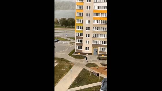 Man battles relentless winds in Minsk, Belarus
