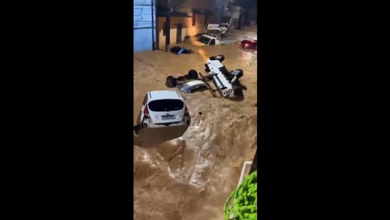 Floodwaters sweep away vehicles in Mimoso do Sul, Brazil