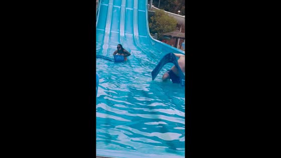 Funny water slide mishap in London, England, UK