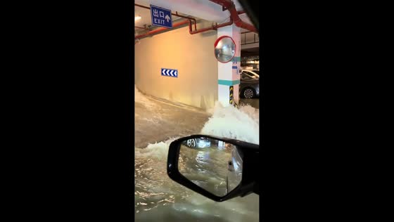 Floodwaters inundate underground parking garage in Guangxi, China