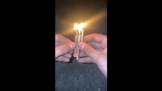 Ukrainian soldier made a lighter from spare parts and a machine gun cartridge