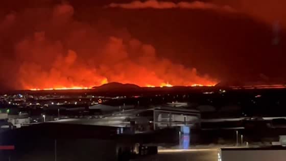 Fiery horizon: Grindavik eruption unleashes red skies in Keflavík, Iceland