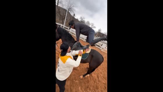 Man falls while attempting to mount horse in Gansu, China
