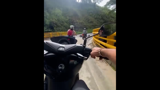 Motorcycle mishap captured on video in Colombia