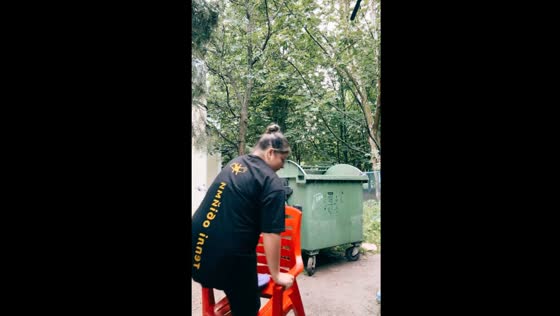 Person falls off plastic chair in Odesa, Ukraine