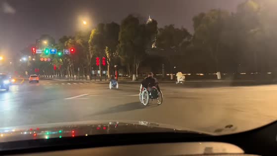 Elderly men race in electric wheelchairs in Zhejiang, China
