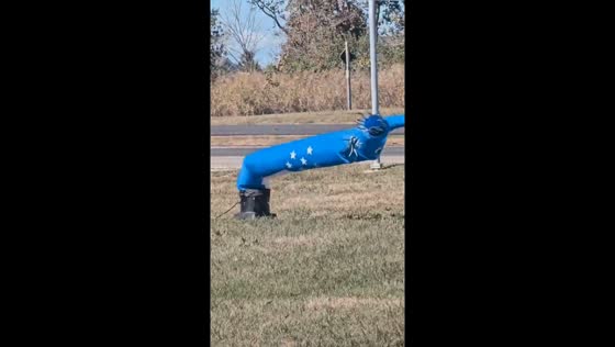 Windy day in St. Louis as inflatable tube man blown away in Wildwood, Missouri, USA