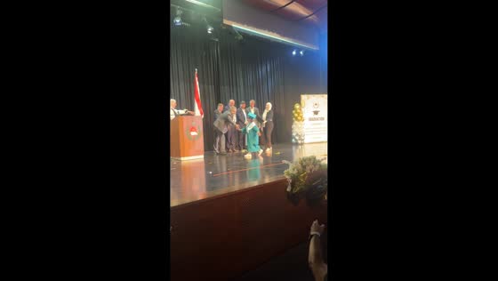 Little girl amuses crowd at graduation ceremony in Beirut, Lebanon