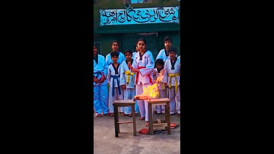 Martial arts student hits flaming wood during demonstration in Amroha, India
