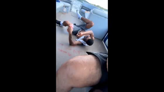 Friend falls on shaking boat at Lake of the Ozarks in Missouri, USA