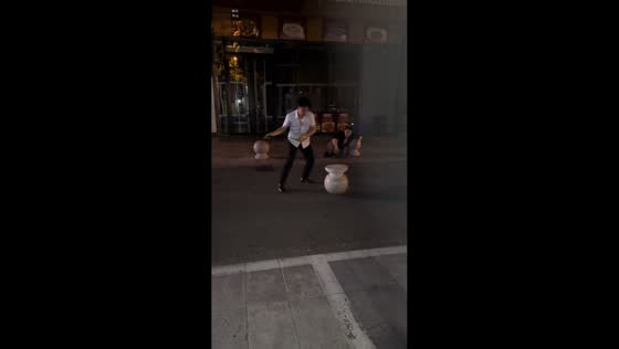 Drunk man fails to spin stone roadblock with belt in Shandong, China