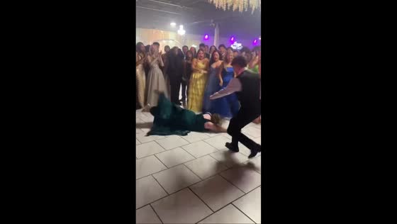 Woman falls during dance move at party in Plainview, Texas, USA
