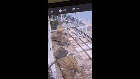 Man falls through roof in security camera mishap in Anhui, China